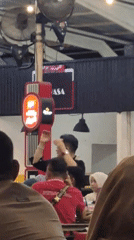 Live band performs at Indonesian cafe during afternoon