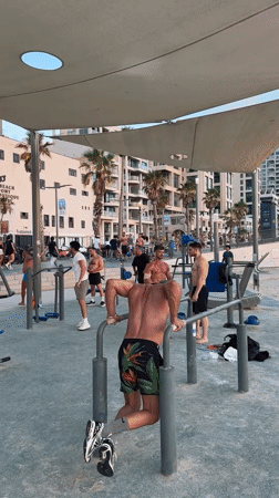 Sunset workout session at Tel Aviv's beachfront calisthenics park