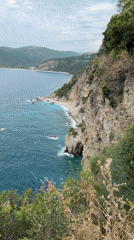 Tourist captures clifftop selfies at Montenegro's dramatic Budva coastline