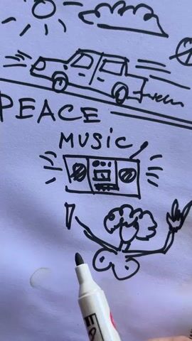 A hand is holding a white marker with pink lettering and is drawing on a white surface. The marker is drawing a figure with arms raised and what appear to be breasts. To the left of the figure, a boombox is drawn with sound waves emanating from it. Above the boombox, the words PEACE MUSIC are written. Above that, a car is drawn driving along a road under a sun and clouds.