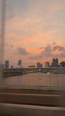 Sunset cityscape captured from bridge in Yuexiu District