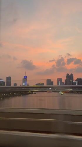 Sunset cityscape captured from bridge in Yuexiu District