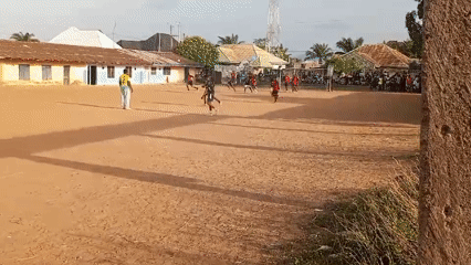 Soccer match on dirt field in Akwanga, Nigeria