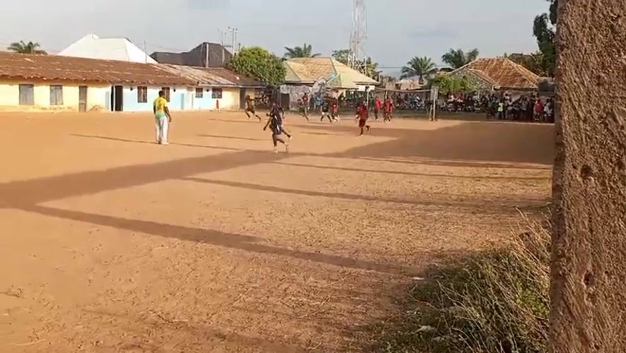 Soccer match on dirt field in Akwanga, Nigeria