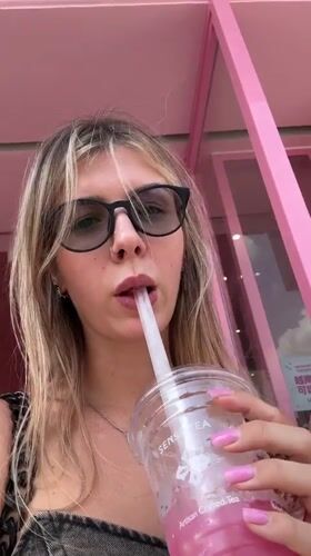 Selfies with a pink drink, inside and out