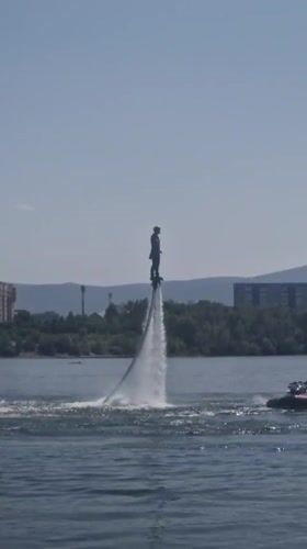 Flyboarding on a sunny Krasnoyarsk waterway