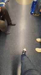 Passenger films subway car interior during morning commute