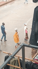 Urban market scenes show residents carrying goods, navigating streets