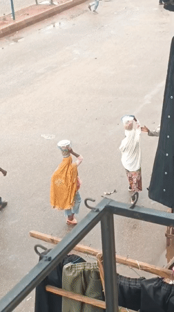 Urban market scenes show residents carrying goods, navigating streets