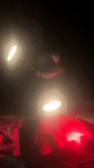 Fire performers entertain beachgoers at night in Ban Haad Rin