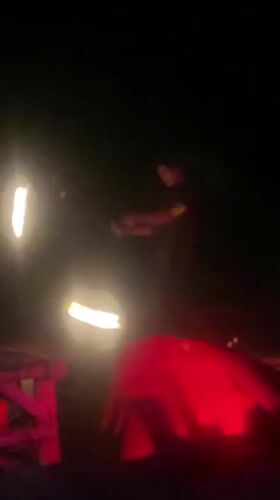 Fire performers entertain beachgoers at night in Ban Haad Rin