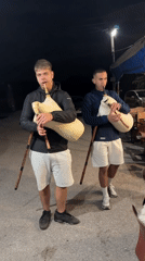 Young musicians perform nighttime bagpipe concert in Bulgarian village