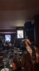 Evening dinner gathering observed at Milan restaurant venue