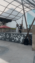 Dance performance, sculpture, painted stairs captured in brief sequence