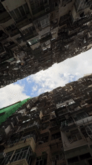Witness documents Hong Kong's dense high-rise residential landscape from below