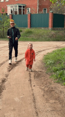 Orange-clad figures documented across Chaikovsky forest and roads