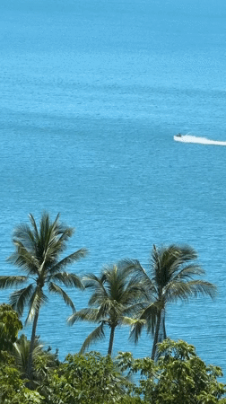 Jet skis cruise ocean waters off Ko Samui coastline