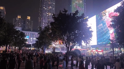 Evening dance gathering draws crowds to Liangjiang city square