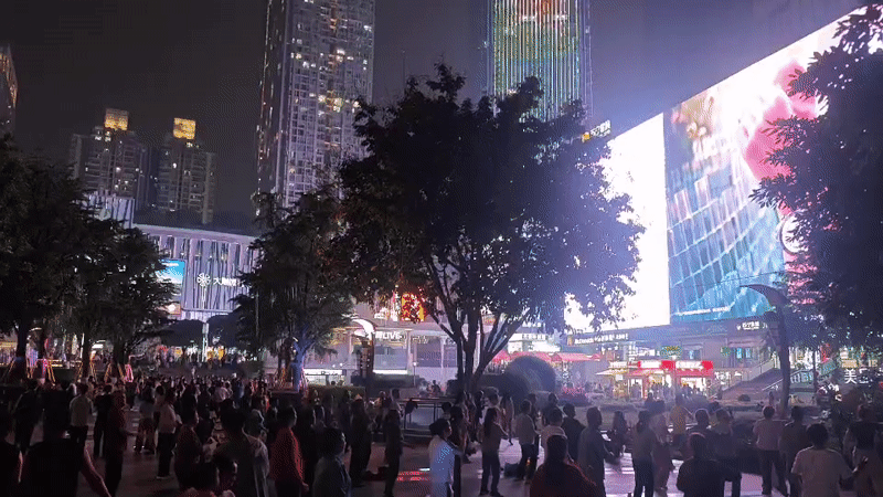 Evening dance gathering draws crowds to Liangjiang city square