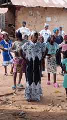 Women gather for musical celebration in Akwanga courtyard