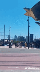 Street performance and city views captured in Barcelona