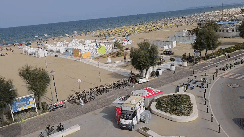 Rimini beach and marina at peak summer, from above