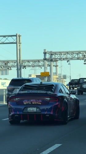 Custom Dodge Charger with graphics spotted in Merrifield traffic