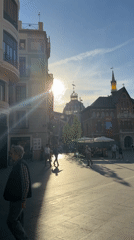 Afternoon plaza life documented in Valencia during golden hour