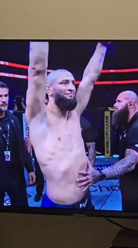 Santiago residents watch UFC Chimaev vs Strickland fight broadcast