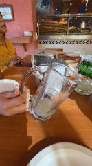 Person prepares drinks at Mexican restaurant in Puebla