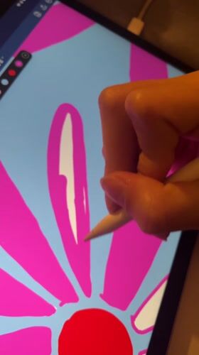 Digital artist creates flower drawing on tablet in Lyon