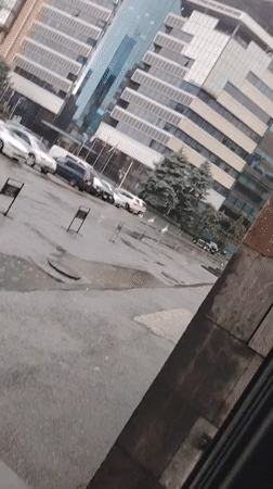 Morning traffic on wet Yerevan streets