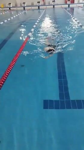 Early morning swimmer trains at indoor pool in Yakutsk