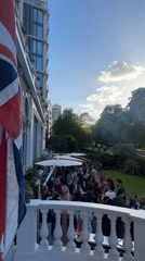 London luxury hotel hosts evening social gathering with British flags