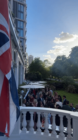 London luxury hotel hosts evening social gathering with British flags
