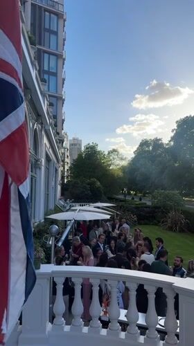 London luxury hotel hosts evening social gathering with British flags