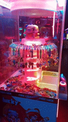 Colorful arcade claw machines documented in Buenos Aires