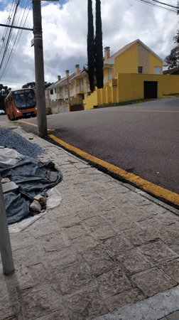 Orange URBS bus passes through Curitiba on regular route