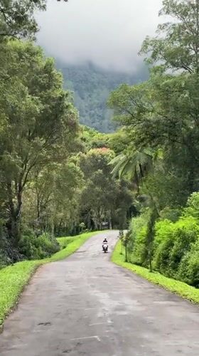 Early morning golf and motorcycle activity in Indonesian mountains