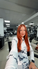 Woman documents tattoo session with selfies in Rostov-on-Don
