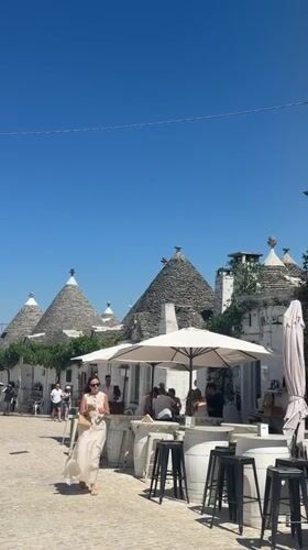 Wandering Alberobello's trulli streets on a sunny afternoon