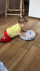 Baby uses robot vacuum as walking aid in Krasnodar