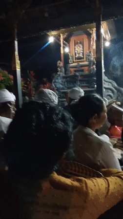 Traditional Balinese ceremony held in Penebel amid blooming gardens