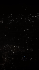 Concert with lunar stage design draws crowds in Paris