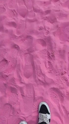 Bright pink sand site in Nanguan District draws activity