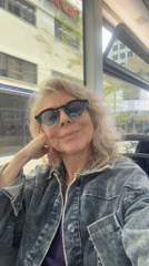 Woman on Tel Aviv bus observed near modern building