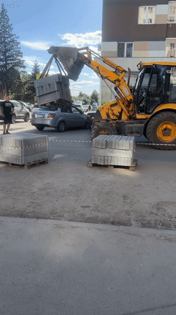 Paving stone delivery operation documented in Ufa residential area