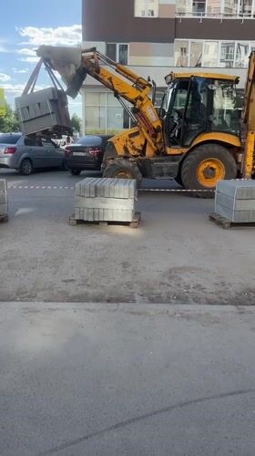 Paving stone delivery operation documented in Ufa residential area