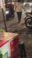 South Jakarta street comes alive at dusk, motorcycles and all