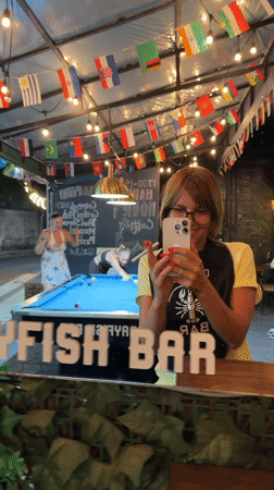 Evening crawfish dining and pool games documented in Kuta